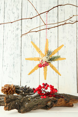 Christmas composition with snowflakes on wooden background