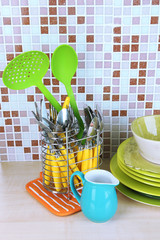 Dishes and cutlery in kitchen