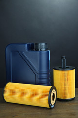 Motor oil canister on grey background
