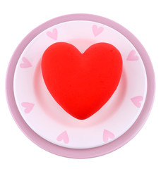 Heart on plate, isolated on white