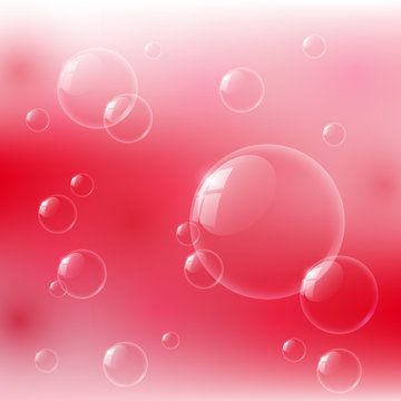 Glossy bubbles on blue background