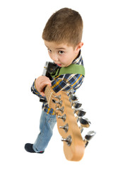 Boy playing the guitar