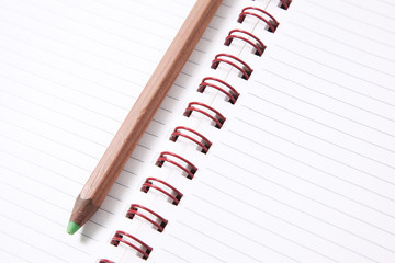 Note book with pencil, isolated