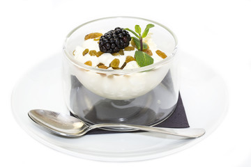 cottage cheese with sour cream and raisins on a white background