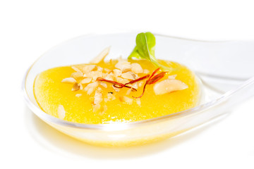 Molecular Cuisine mango jelly on white background