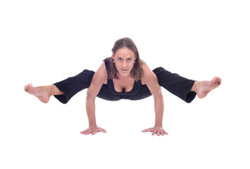 Fototapeta na wymiar woman arm balance yoga - doing split