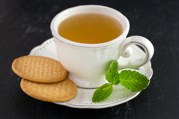 cup of tea with cookies
