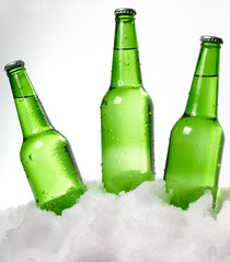 beer bottles in snow