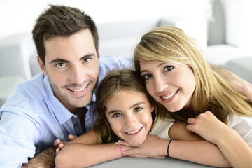 Portrait of happy family at home © goodluz