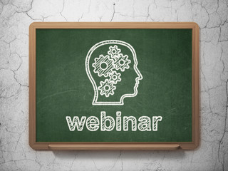 Education concept: Head With Gears and Webinar on chalkboard