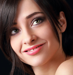 Beautiful smiling makeup woman face. Closeup portrait