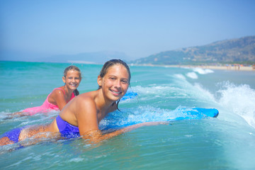 Summer vacation - surfer girls.