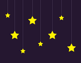 Stars hanging on strings over dark sky background