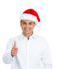 Smiling christmas man giving thumbs up