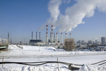 Power plant with smoking chimneys in Moscow.