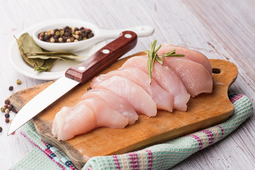 Fresh chicken on wooden table