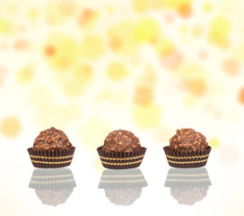 chocolate candy in tartlet form on colorful background