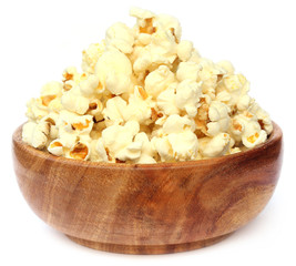 Popcorns on wooden bowl