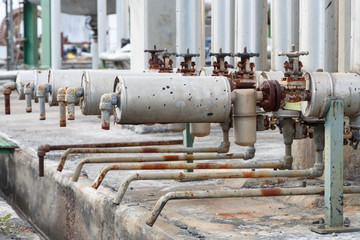 close-up of old steam trap valve on pipe connection