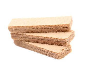 Stake of three wafers with chocolate.