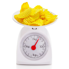 Potato chips on balance scale