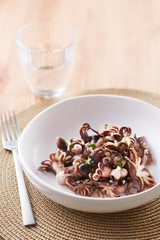 Sauteed baby octopus dish