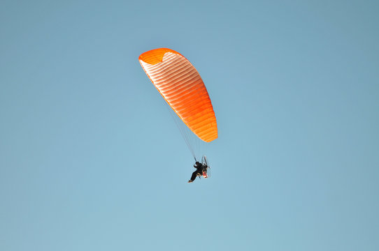 paramotor glider in the sky