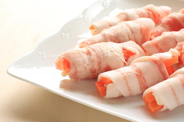 prepared bacon and carrot cheese roll