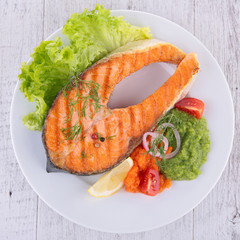 grilled salmon steak and vegetables