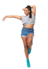 Beautiful smiling woman in dance pose