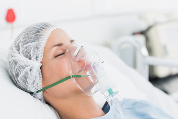 Female patient receiving artificial ventilation