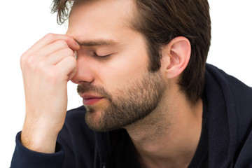 Obraz premium Close-up of a stressed handsome young man