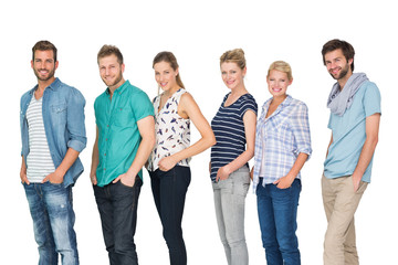 Obraz premium casual happy people standing with hands in pockets