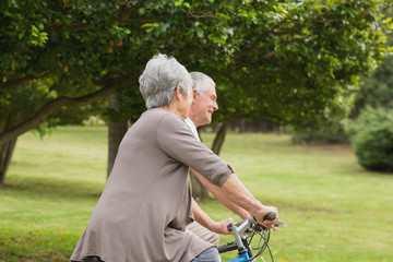 Senior couple on cycle ride in countryside