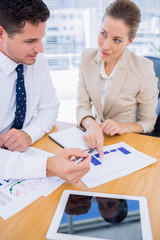 Smartly dressed colleagues in business meeting