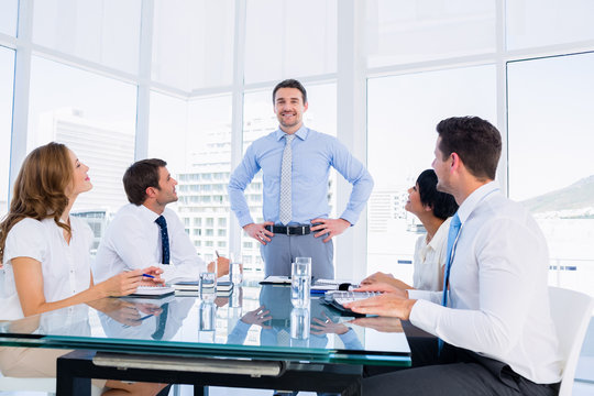 Executives Sitting Around Conference Table