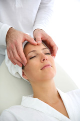 Closeup of woman haveing a face massage