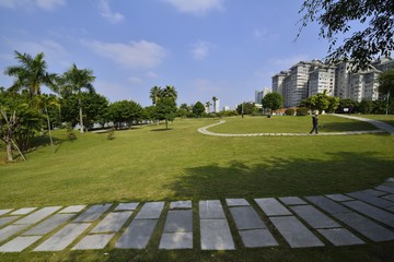 The park scenery under the blue sky and white clouds