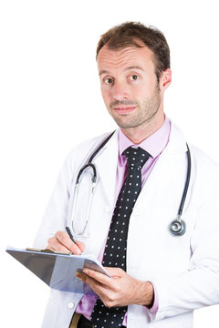 Confident male doctor taking patient's notes