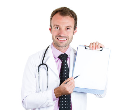 Smiling male doctor holding clipboard with blank document