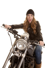 Fototapeta na wymiar woman black leather motorcycle scared