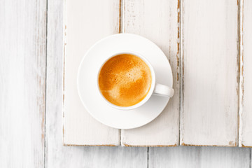 espresso coffee in white cup on old rustic  style table