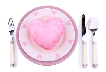 Heart on plate, isolated on white
