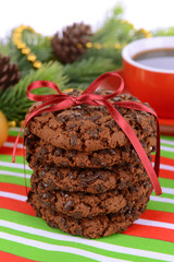 Sweet cookies with cup of tea on table close-up