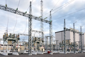 High voltage electric power substation in autumn day