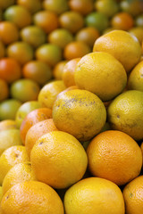 Stack of Fresh Oranges at Farmers Market