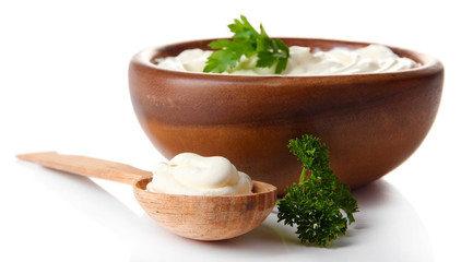 Sour cream in bowl isolated on white