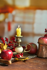 Composition with apples and candle