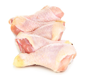 Raw chicken legs isolated on white