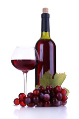 Wineglass with red wine, grape and bottle isolated on white